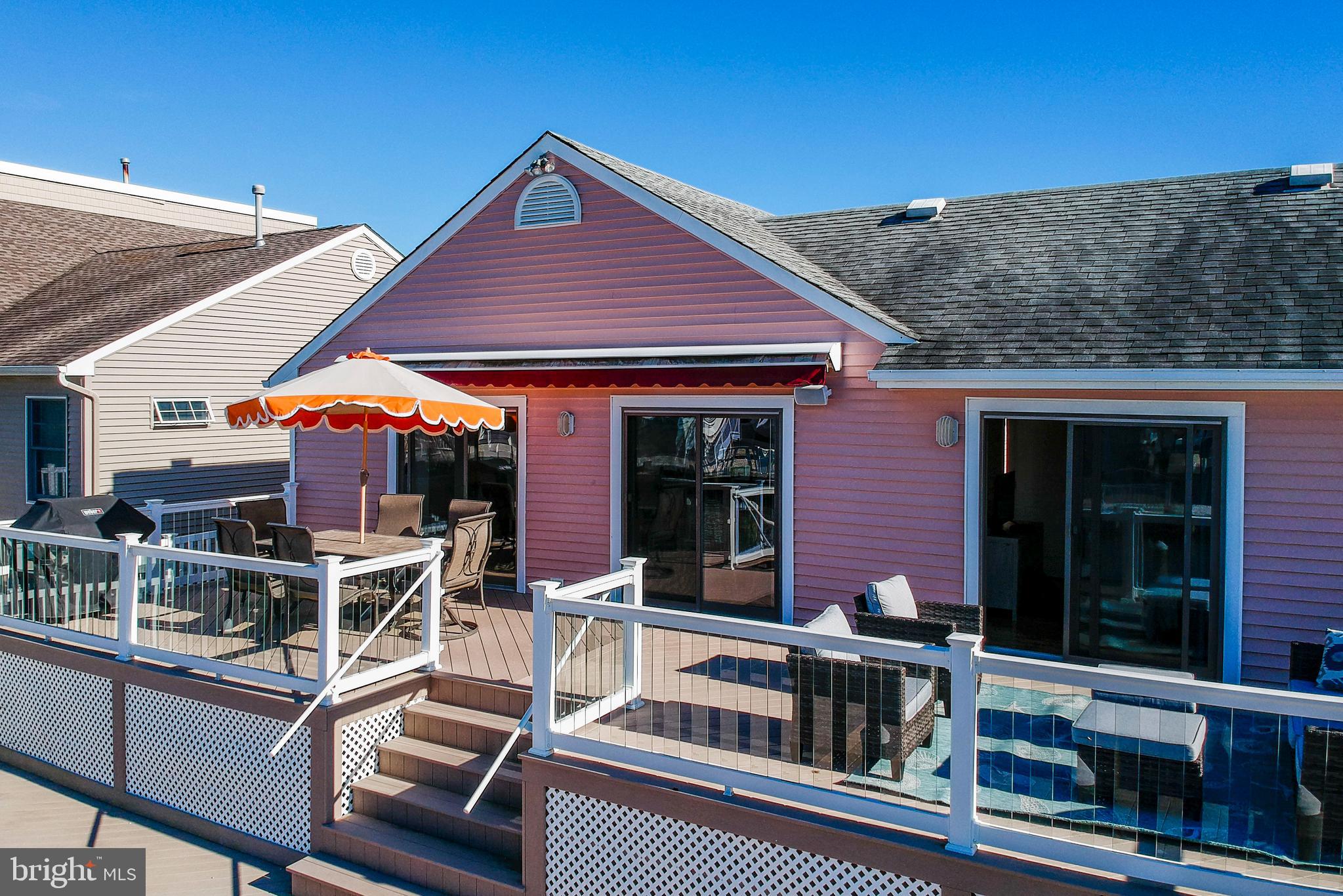 28 Diane Road Manahawkin, NJ 08050 - Photo 11 of 46 a view of a chairs and table in a patio