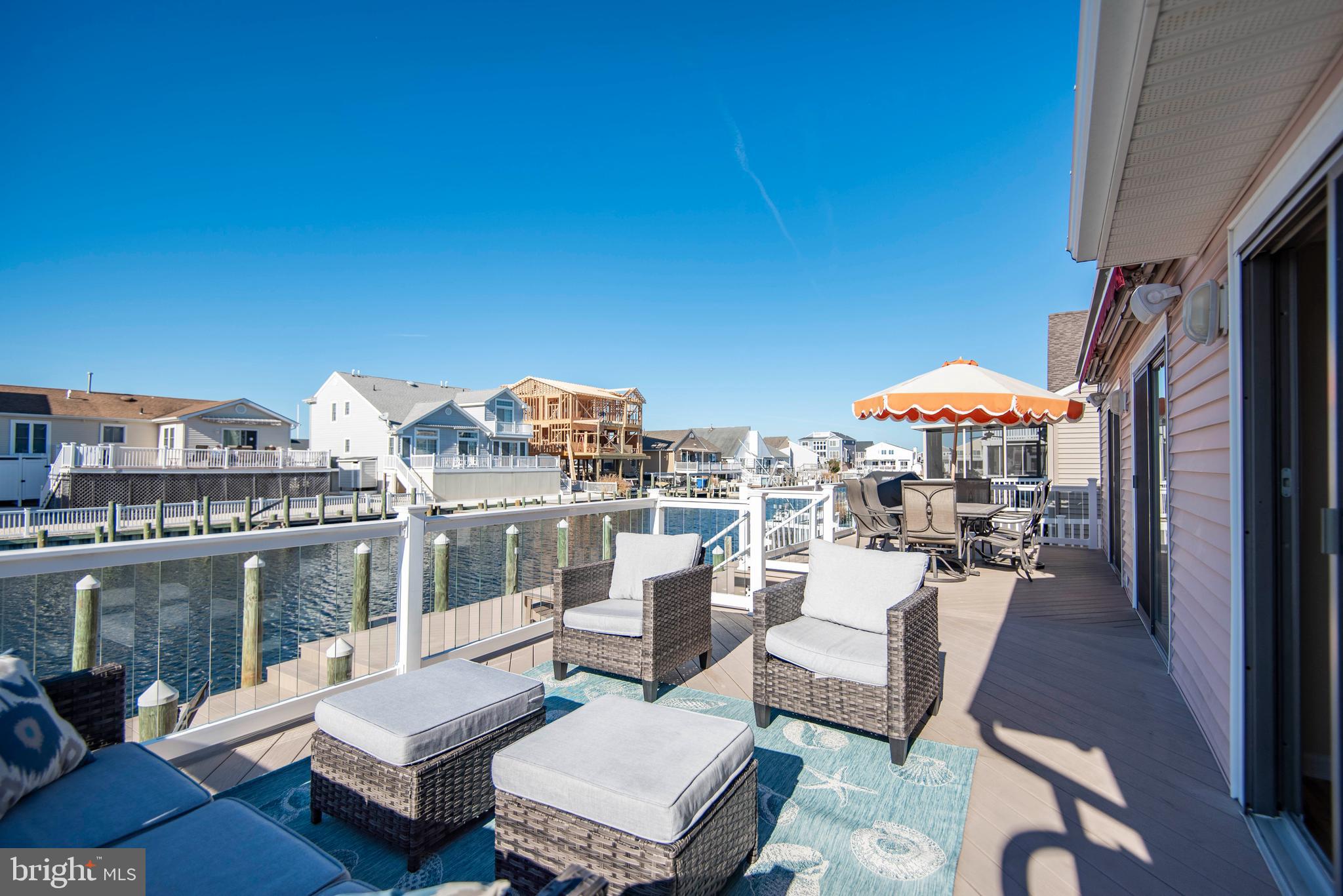 28 Diane Road Manahawkin, NJ 08050 - Photo 13 of 46 a view of a terrace with couches and potted plants