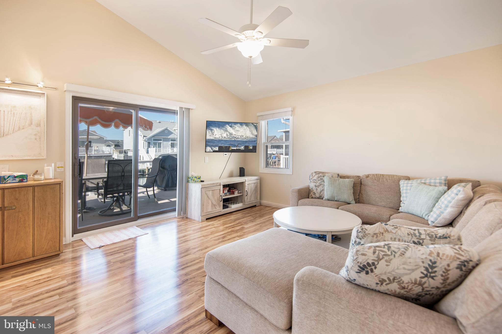 28 Diane Road Manahawkin, NJ 08050 - Photo 21 of 46 a living room with furniture and a large window