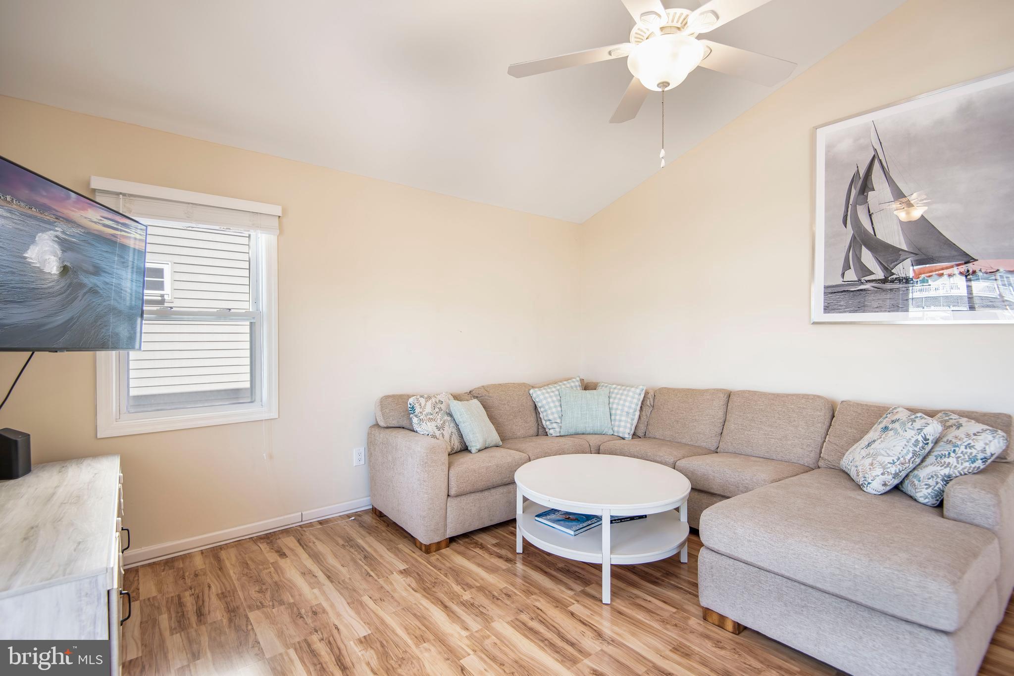 28 Diane Road Manahawkin, NJ 08050 - Photo 22 of 46 a living room with furniture and a window