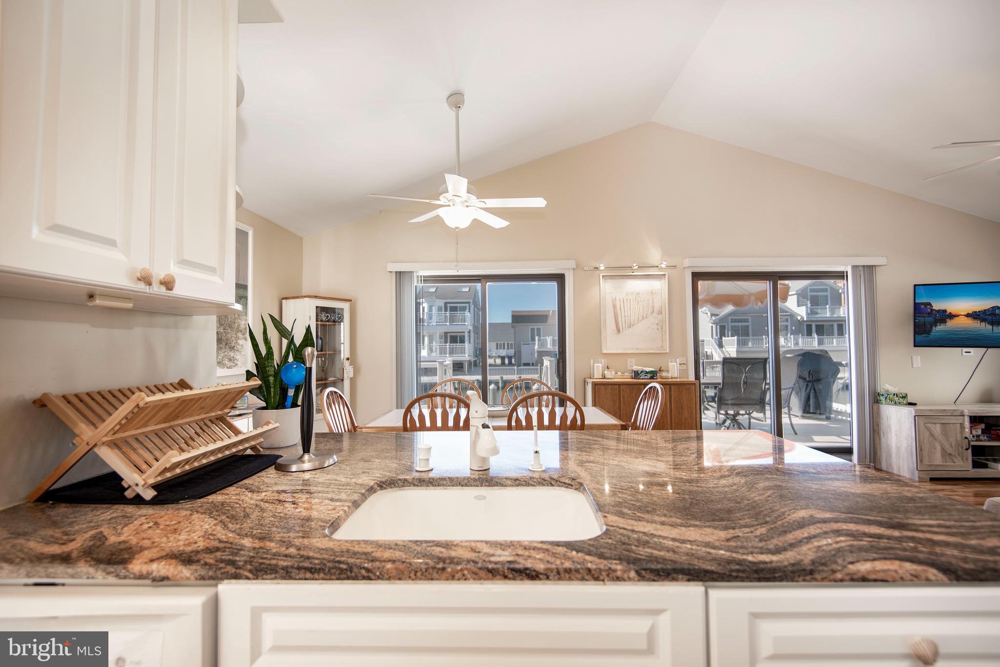 28 Diane Road Manahawkin, NJ 08050 - Photo 25 of 46 a living room with furniture and a fireplace