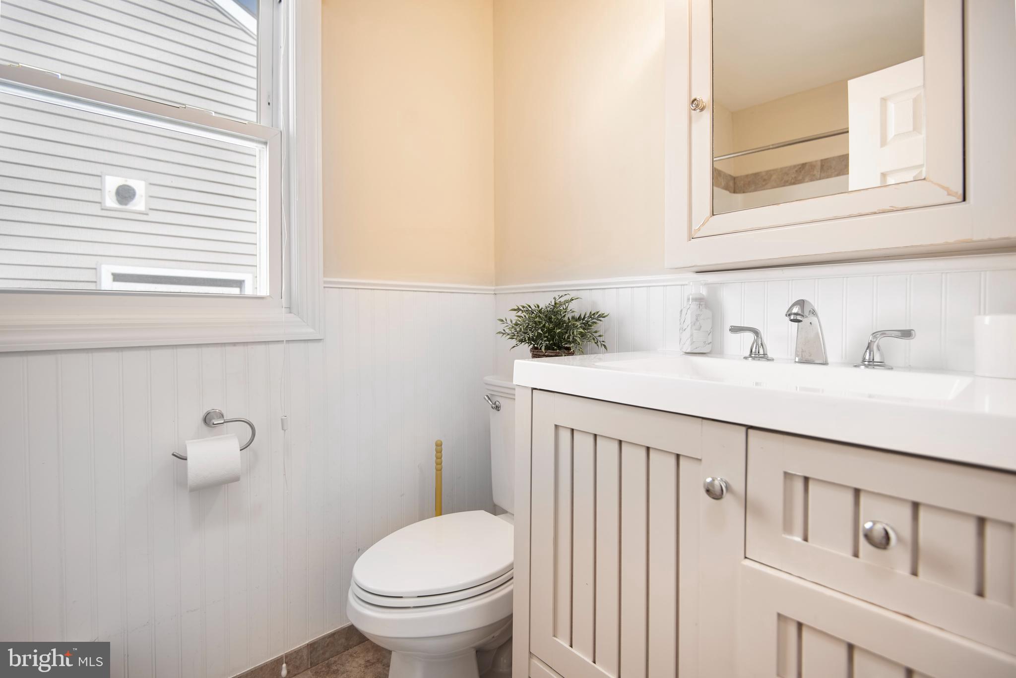 28 Diane Road Manahawkin, NJ 08050 - Photo 32 of 46 a bathroom with a sink and a toilet
