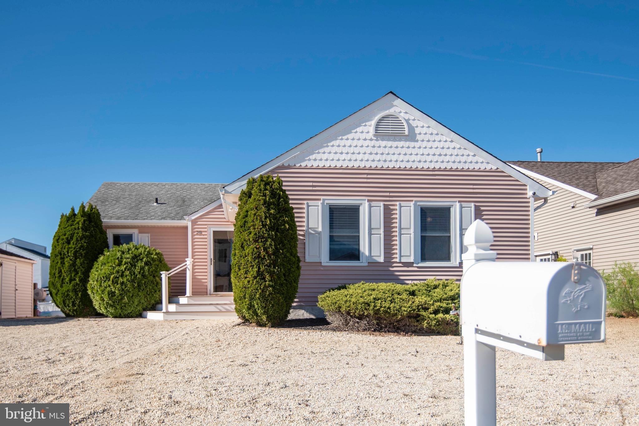 28 Diane Road Manahawkin, NJ 08050 - Photo 39 of 46 a front view of a house with a yard