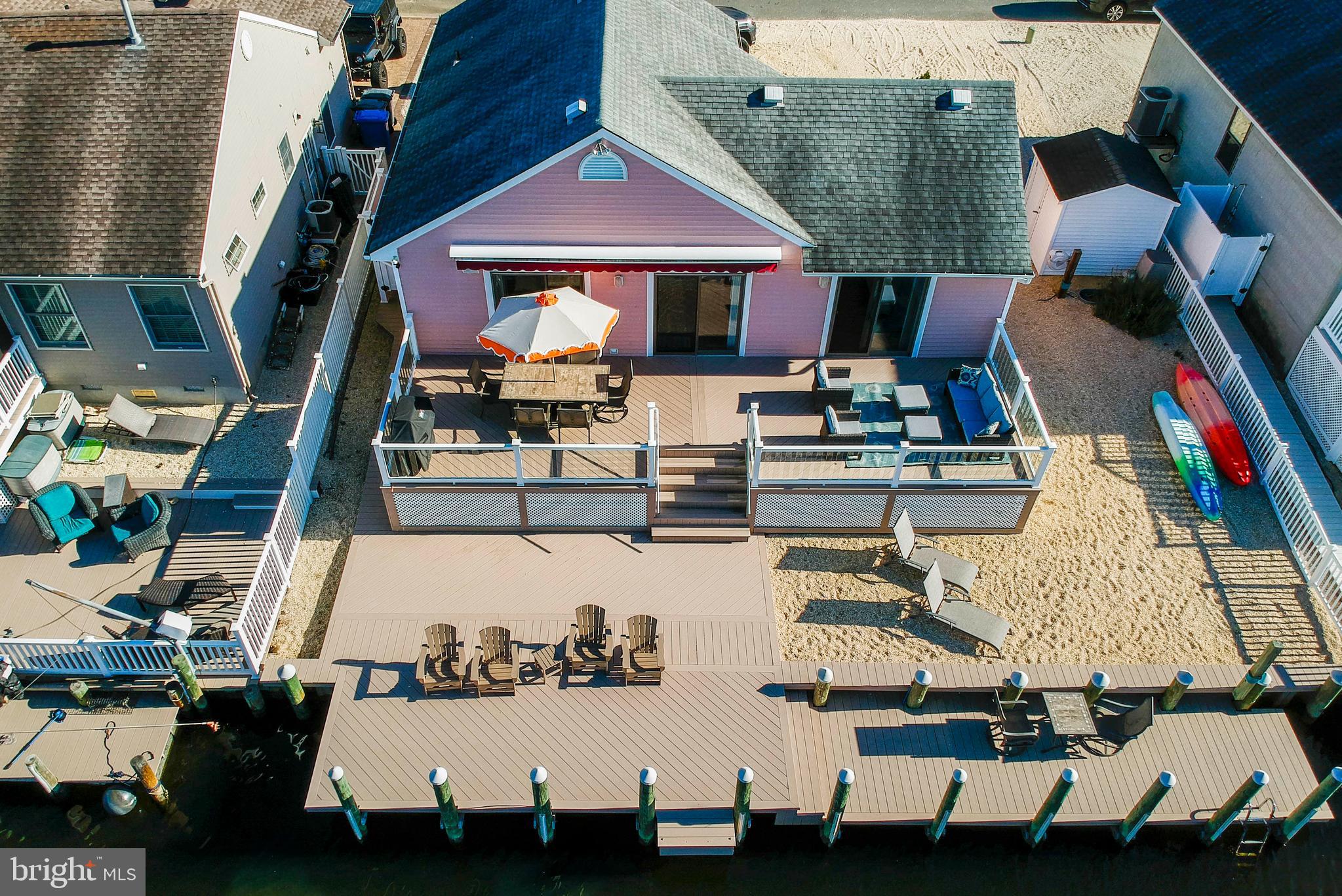28 Diane Road Manahawkin, NJ 08050 - Photo 6 of 46 an aerial view of a house with swimming pool