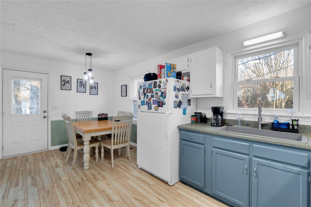 11 Trammell Street Liberty, SC 29657 - Photo 12 of 24 This bright kitchen features ample counter space and offers a seamless flow for daily living.