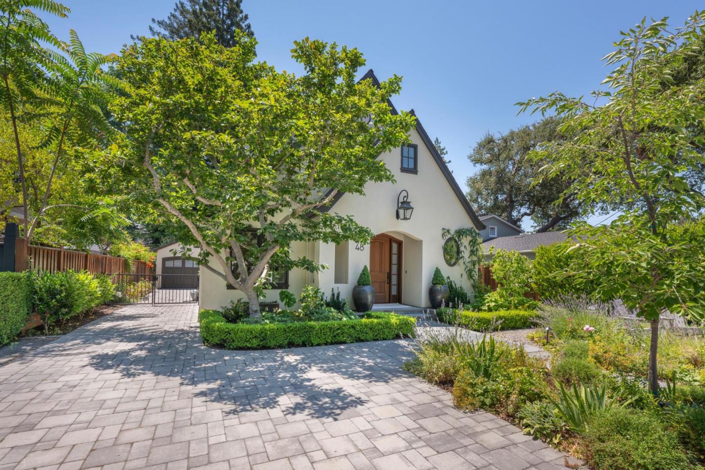 48 Middlegate Street Atherton, CA 94027 - Photo 1 of 27 a front view of a house with garden