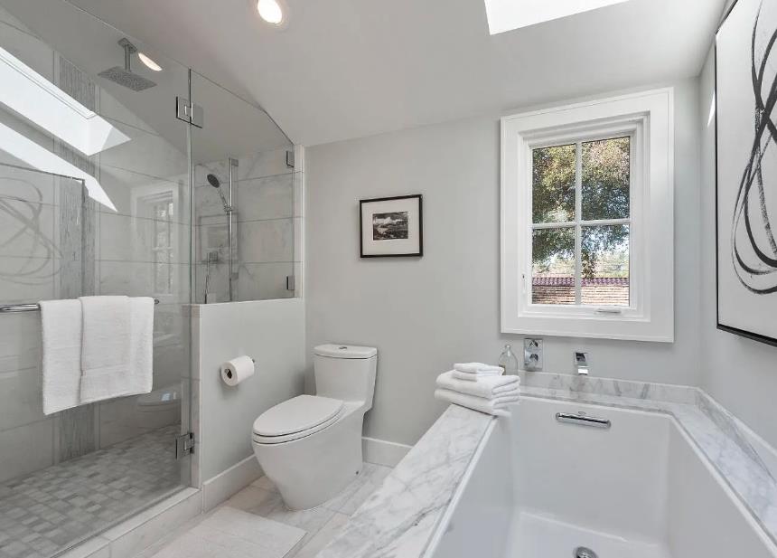 48 Middlegate Street Atherton, CA 94027 - Photo 13 of 27 a bathroom with a granite countertop sink toilet a large mirror a bathtub and window