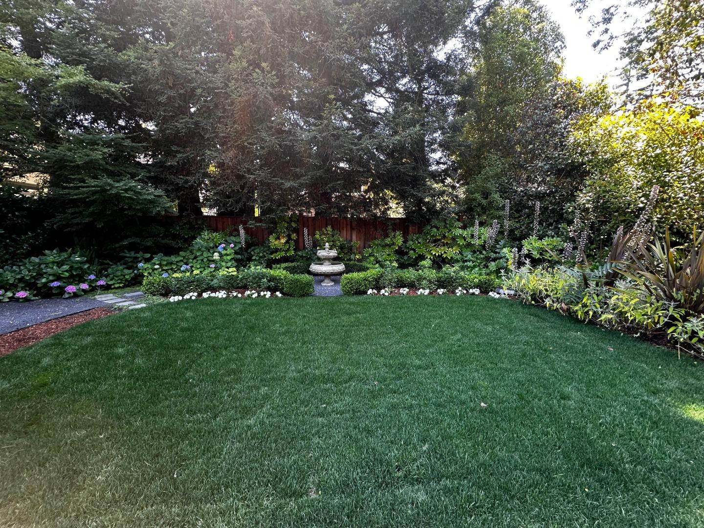 48 Middlegate Street Atherton, CA 94027 - Photo 26 of 27 a view of a green field with lots of bushes