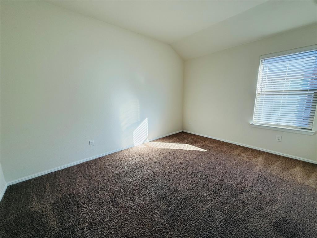 9328 Castorian Drive Fort Worth, TX 76131 - Photo 21 of 24 an empty room with a window