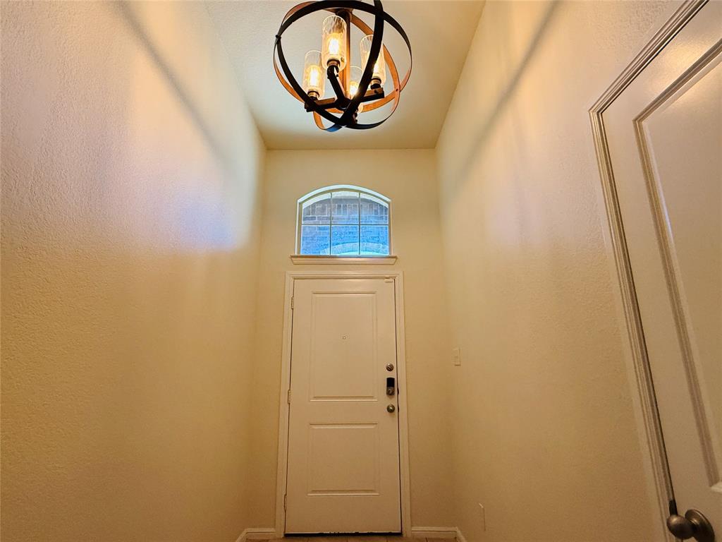 9328 Castorian Drive Fort Worth, TX 76131 - Photo 4 of 24 a picture of a door of a house