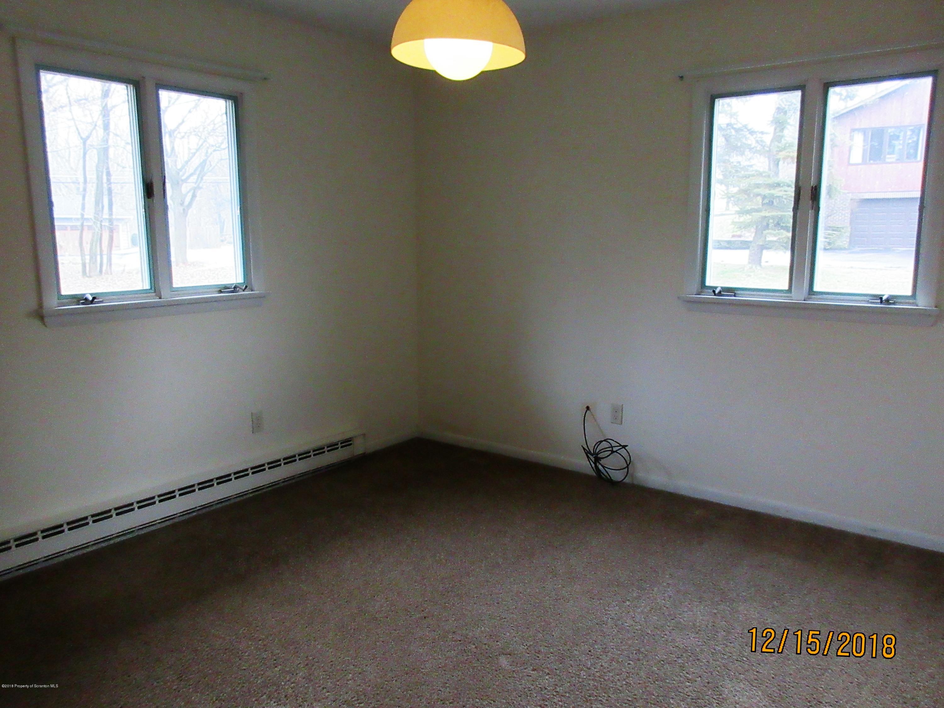 719 North Abington Road Clarks Summit, PA 18411 - Photo 15 of 37 an empty room with a window