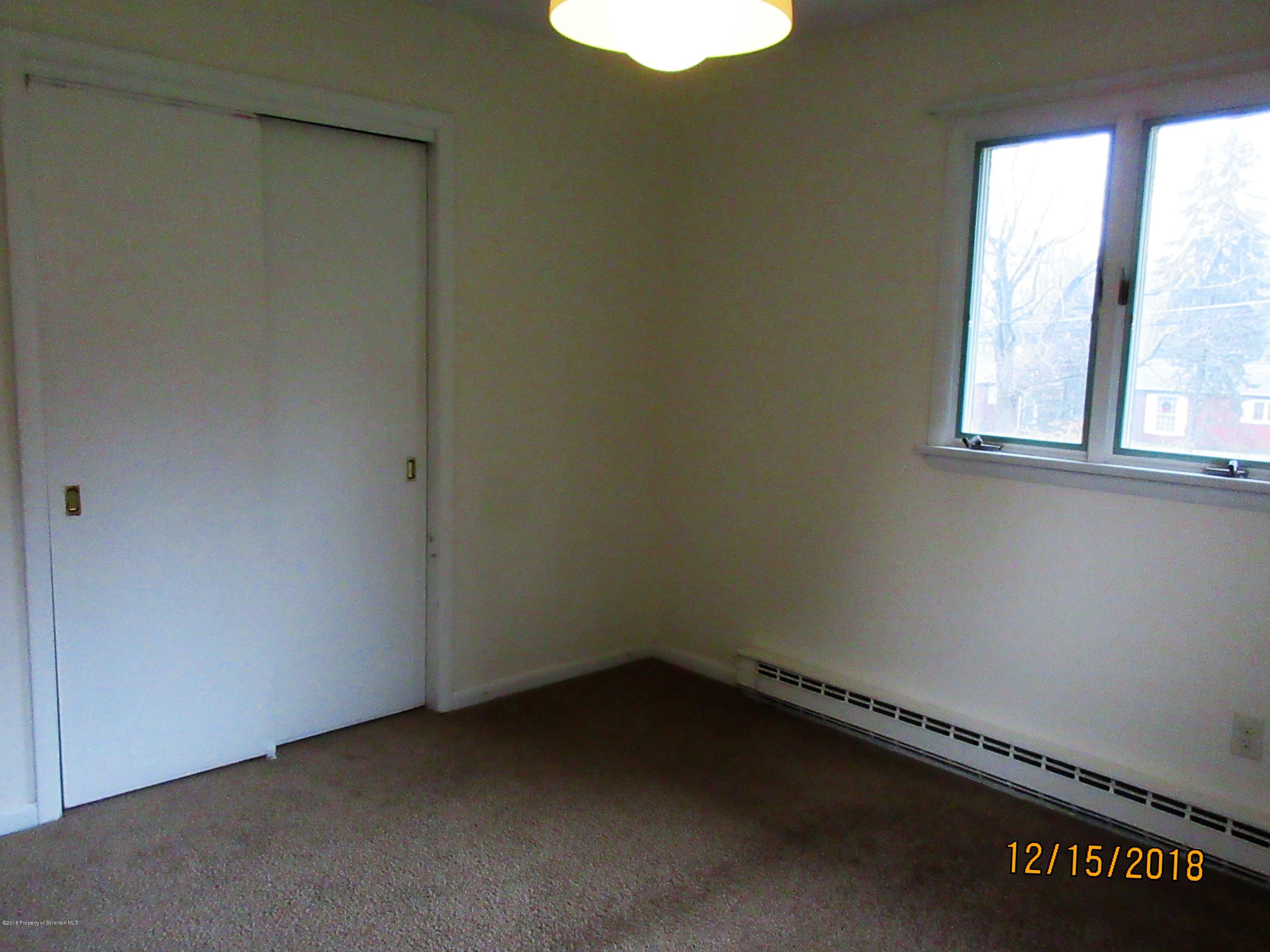 719 North Abington Road Clarks Summit, PA 18411 - Photo 16 of 37 an empty room with a window