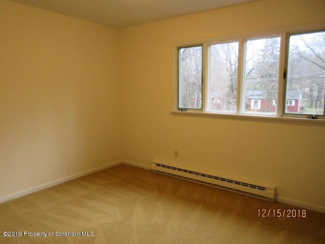 719 North Abington Road Clarks Summit, PA 18411 - Photo 17 of 37 an empty room with a window