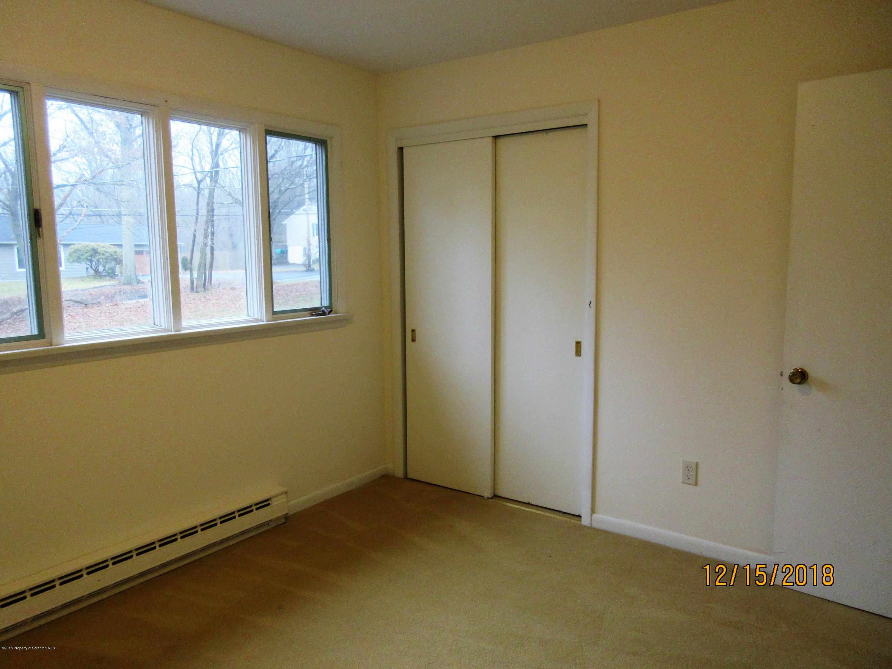 719 North Abington Road Clarks Summit, PA 18411 - Photo 18 of 37 an empty room with a window