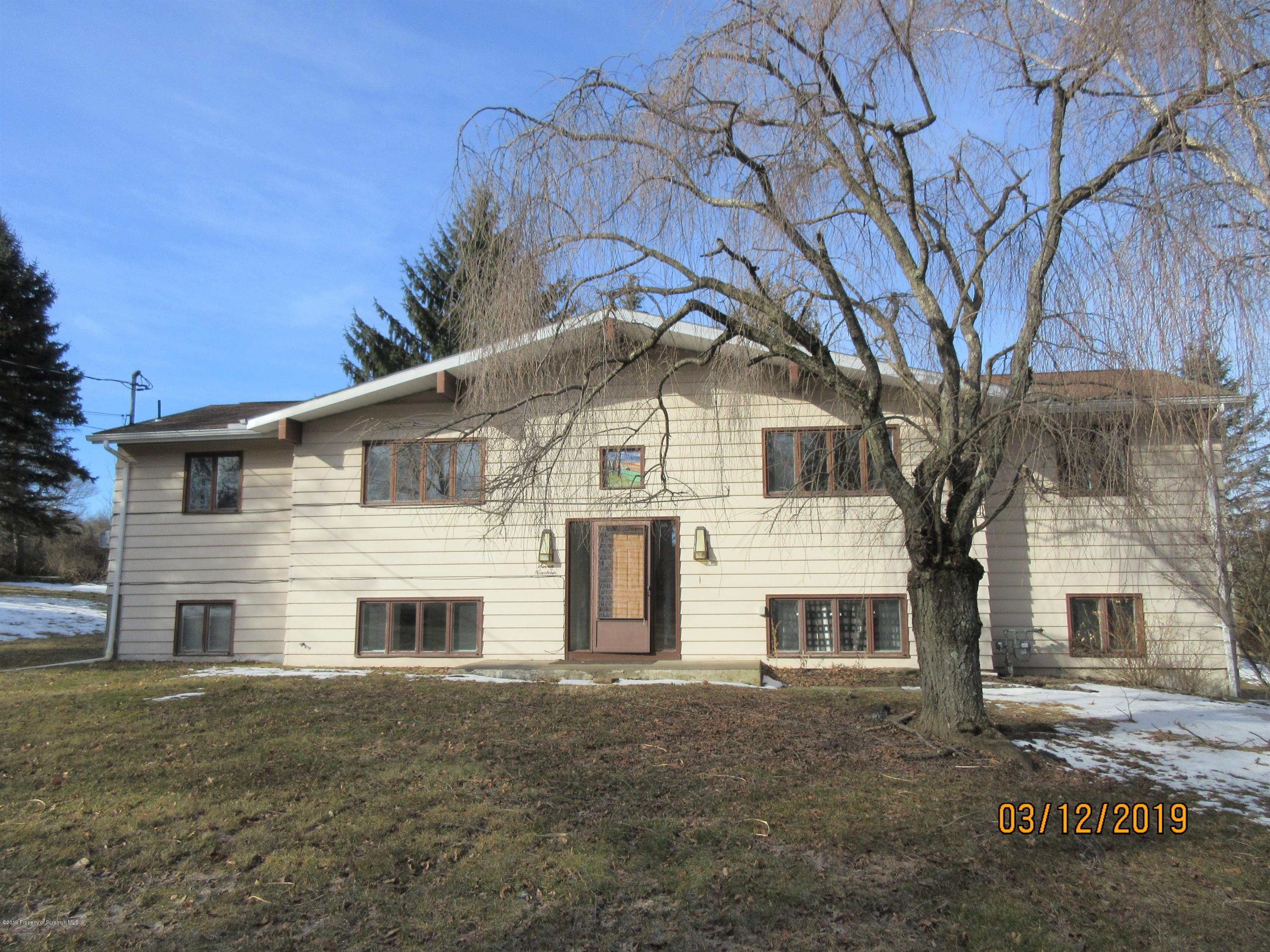 719 North Abington Road Clarks Summit, PA 18411 - Photo 2 of 37 a view of a house with a yard