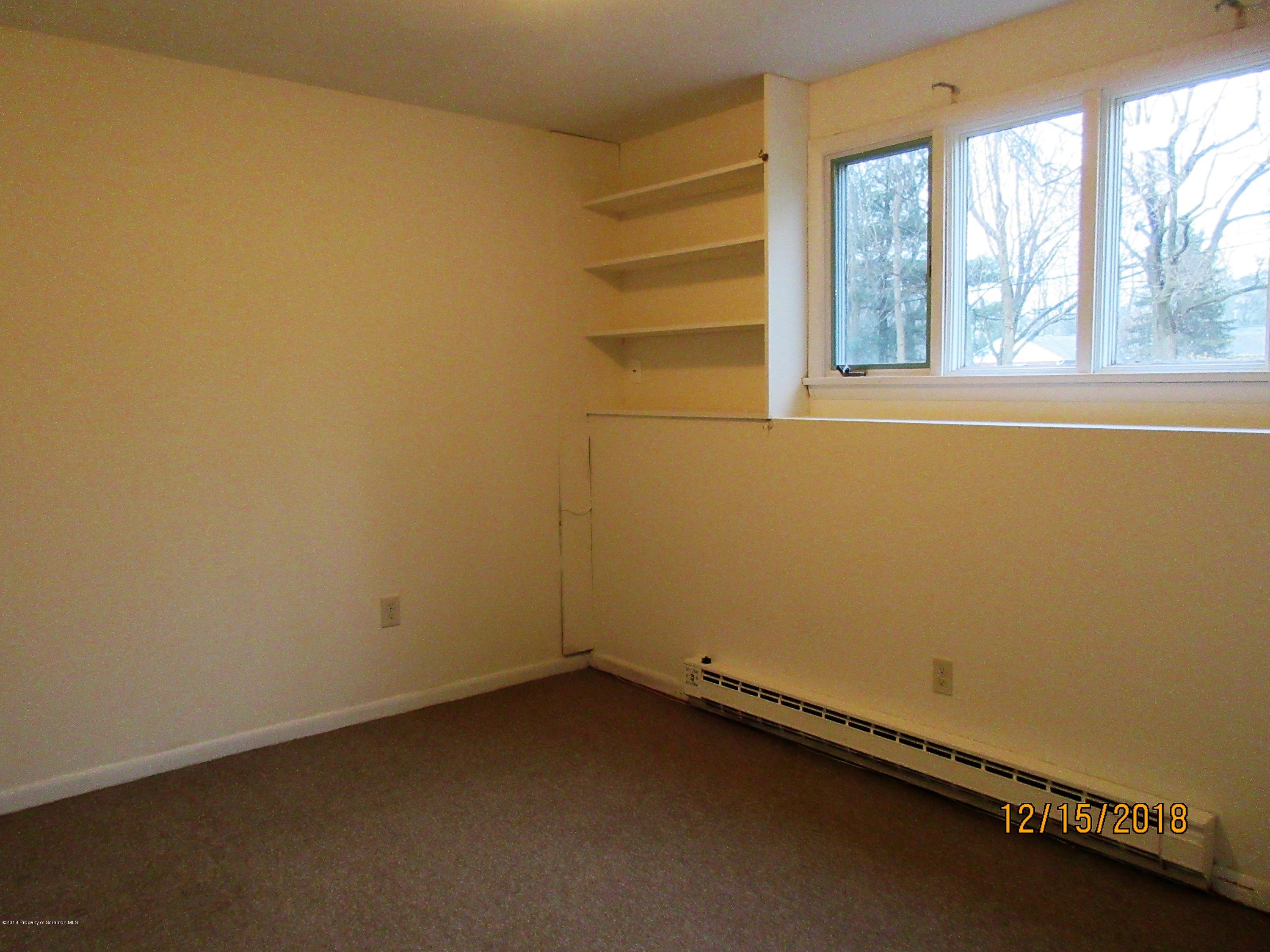 719 North Abington Road Clarks Summit, PA 18411 - Photo 28 of 37 an empty room with a window