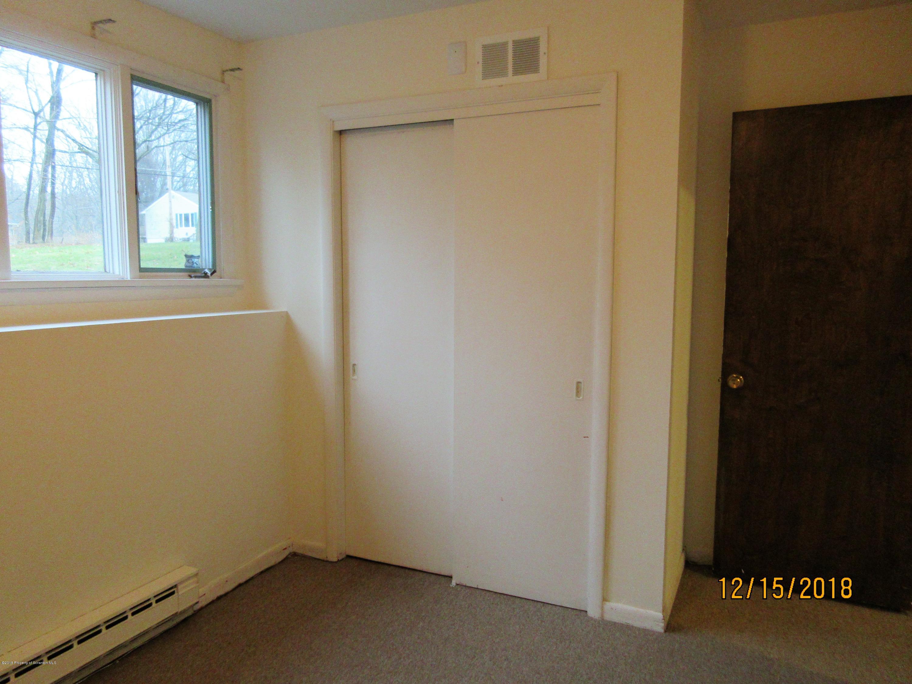 719 North Abington Road Clarks Summit, PA 18411 - Photo 29 of 37 an empty room with windows