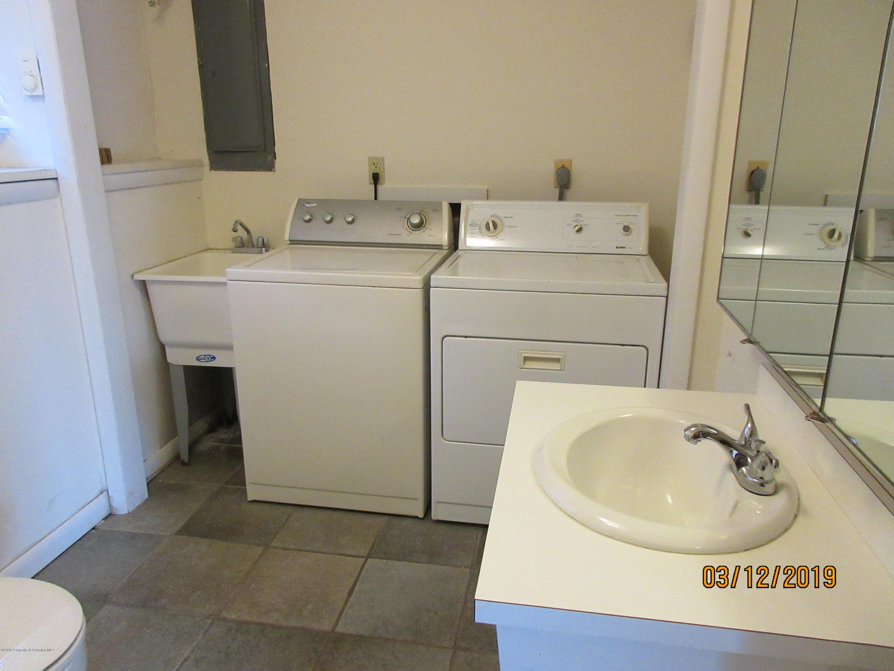 719 North Abington Road Clarks Summit, PA 18411 - Photo 31 of 37 a utility room with dryer and washer