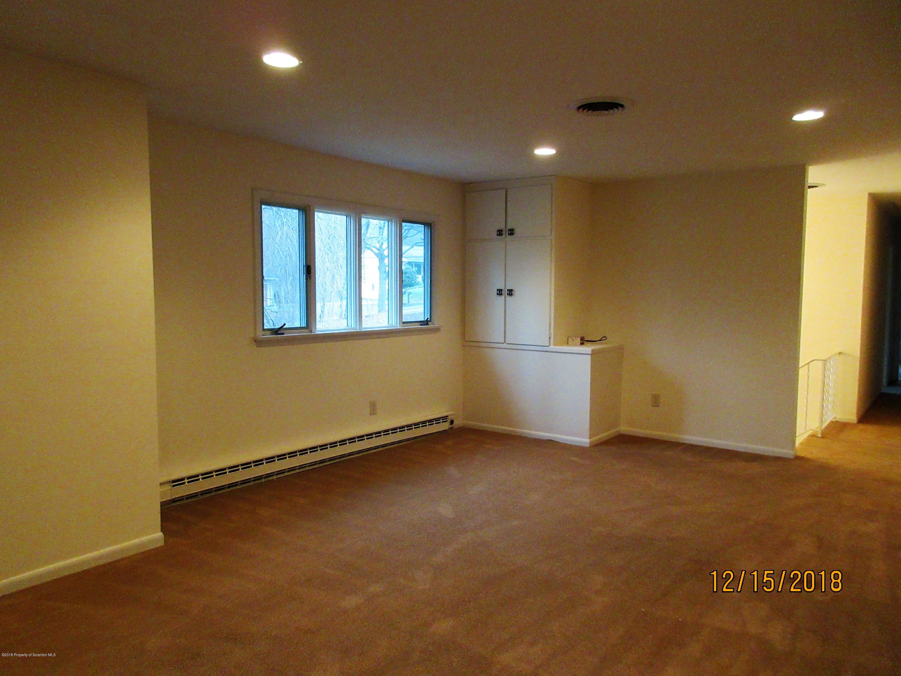 719 North Abington Road Clarks Summit, PA 18411 - Photo 5 of 37 a view of an empty room with a window