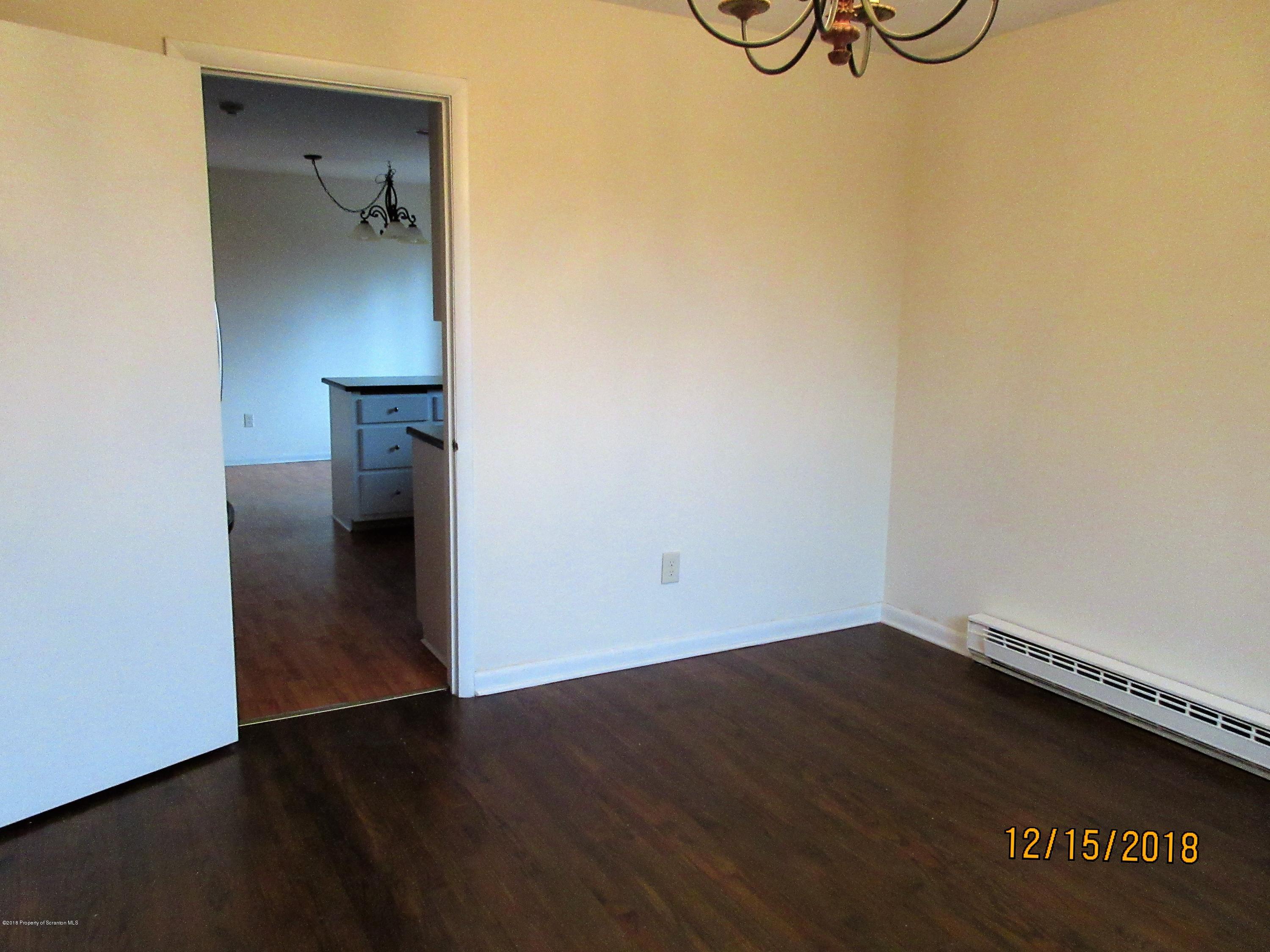 719 North Abington Road Clarks Summit, PA 18411 - Photo 7 of 37 a view of a storage & utility room with a sink
