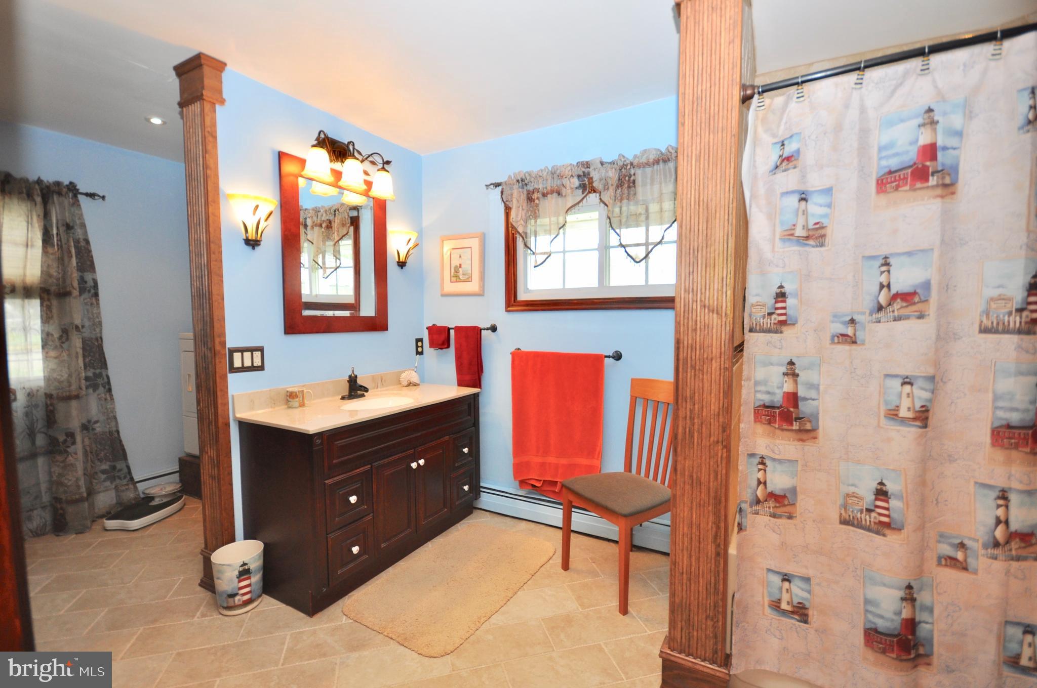 9222 Treaty Road Philadelphia, PA 19114 - Photo 17 of 43 First floor bath with washer & dryer area