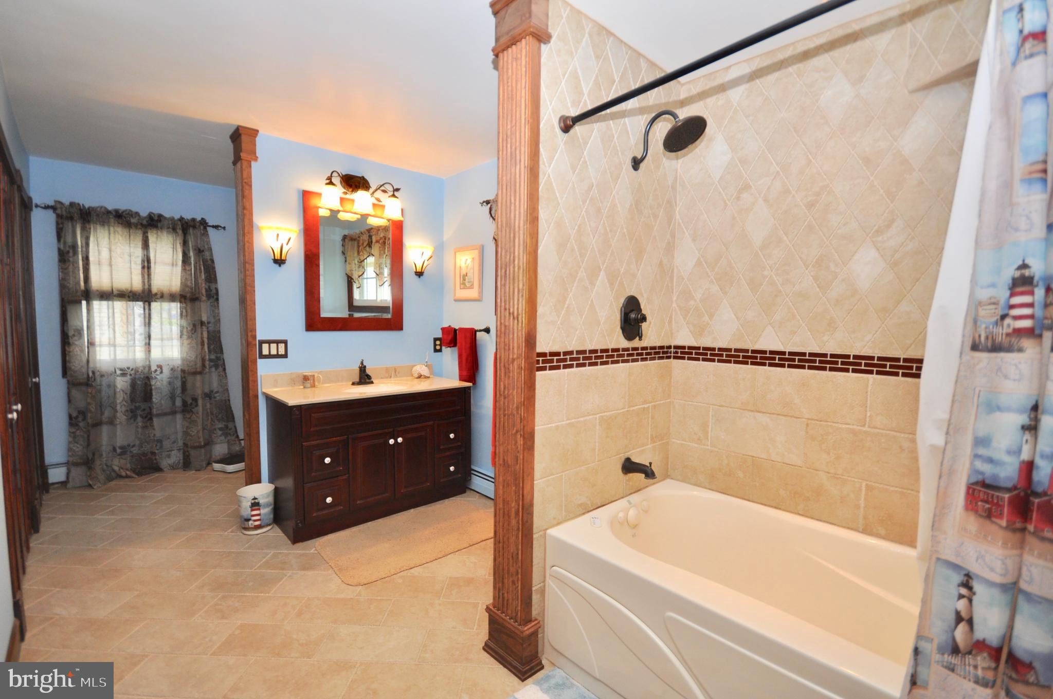 9222 Treaty Road Philadelphia, PA 19114 - Photo 19 of 43 Custom tiled 1st floor bathroom with tub