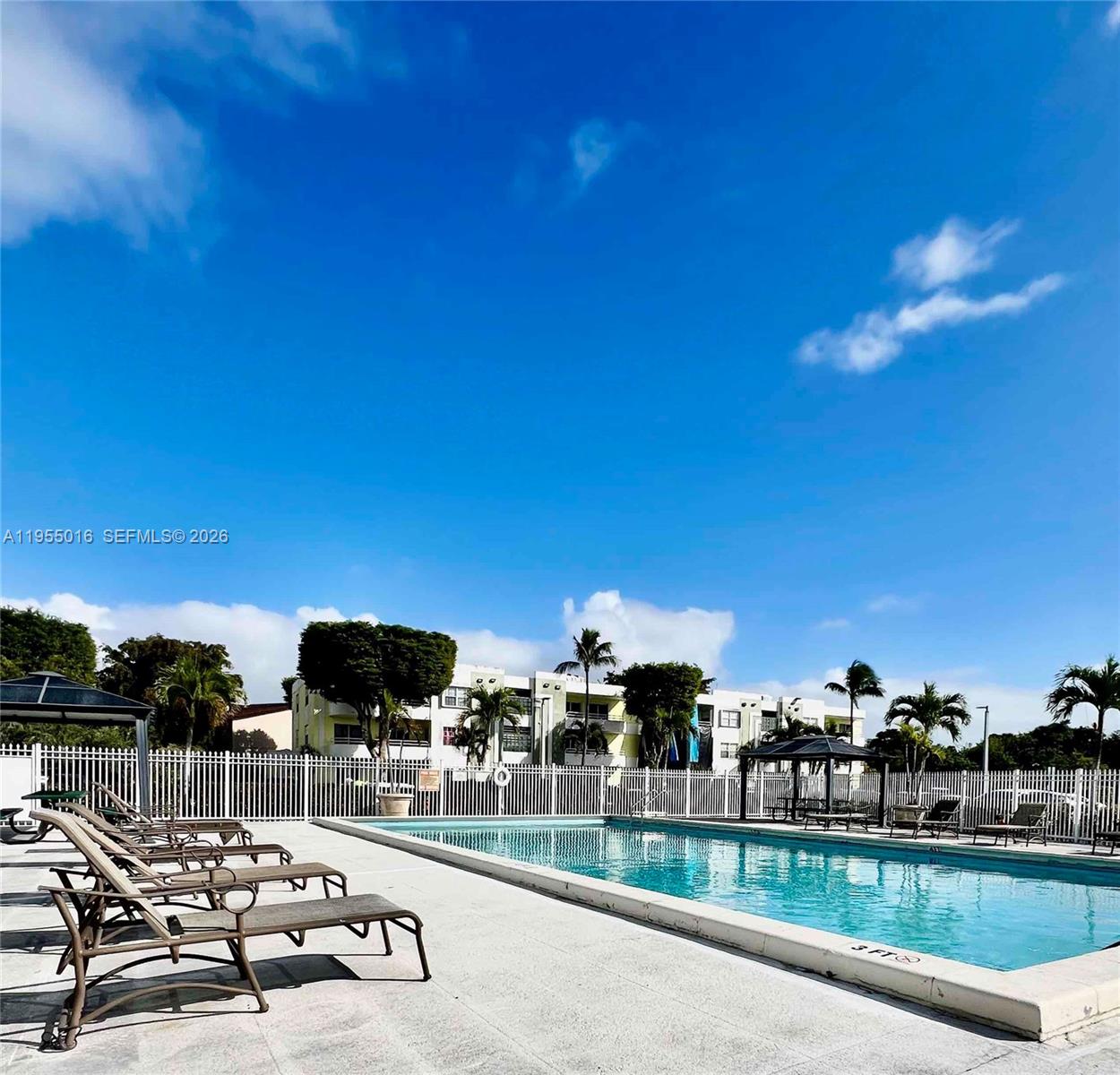 a view of a yard and patio