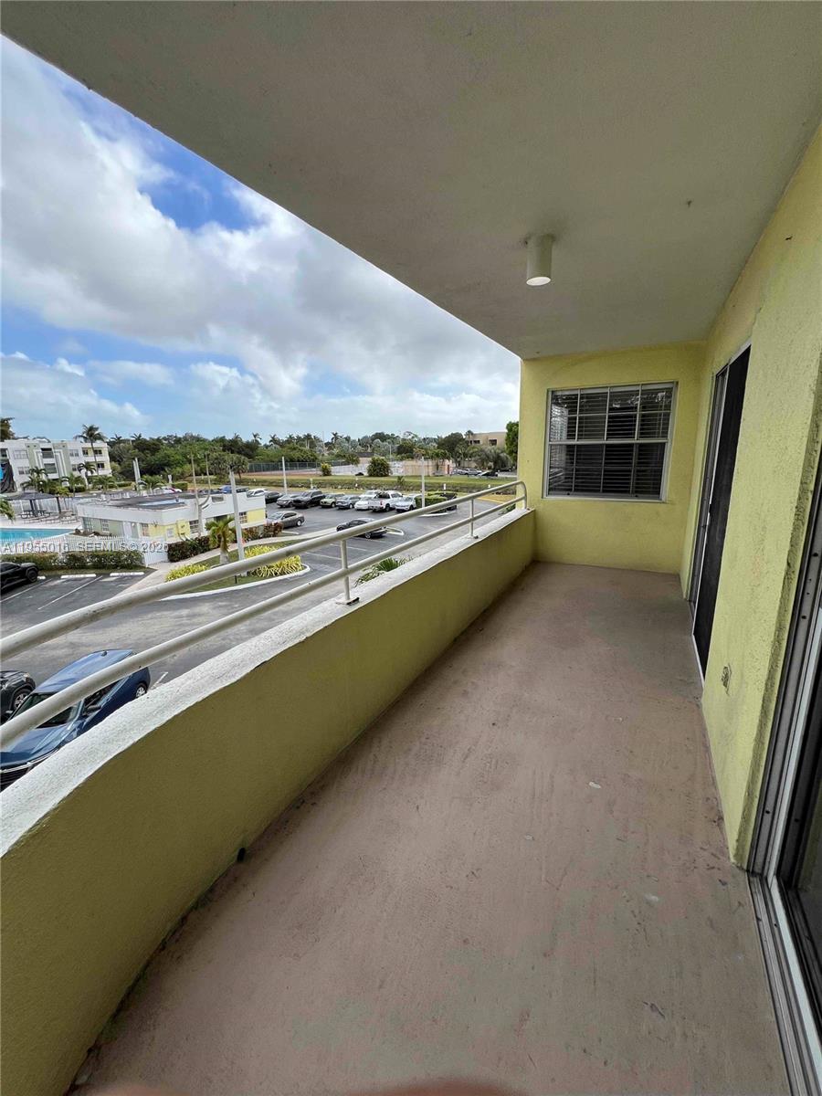 10785 Southwest 108th Avenue, Unit 308 Miami, FL 33176 - Photo 18 of 21 a view of a kitchen with a sink and dishwasher