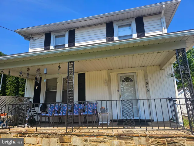 a front view of a house with balcony