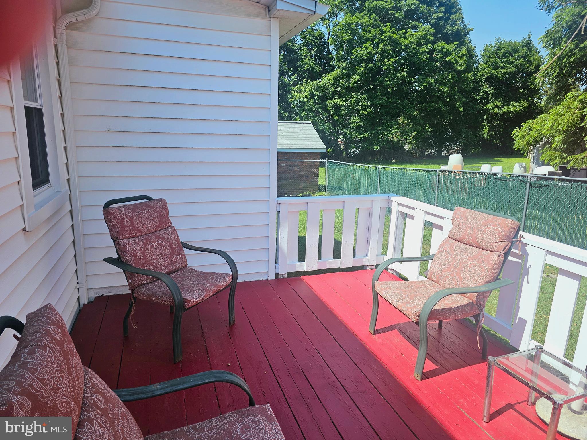 3506 Bayer Avenue Randallstown, MD 21133 - Photo 29 of 36 a view of a patio with a table chairs and backyard