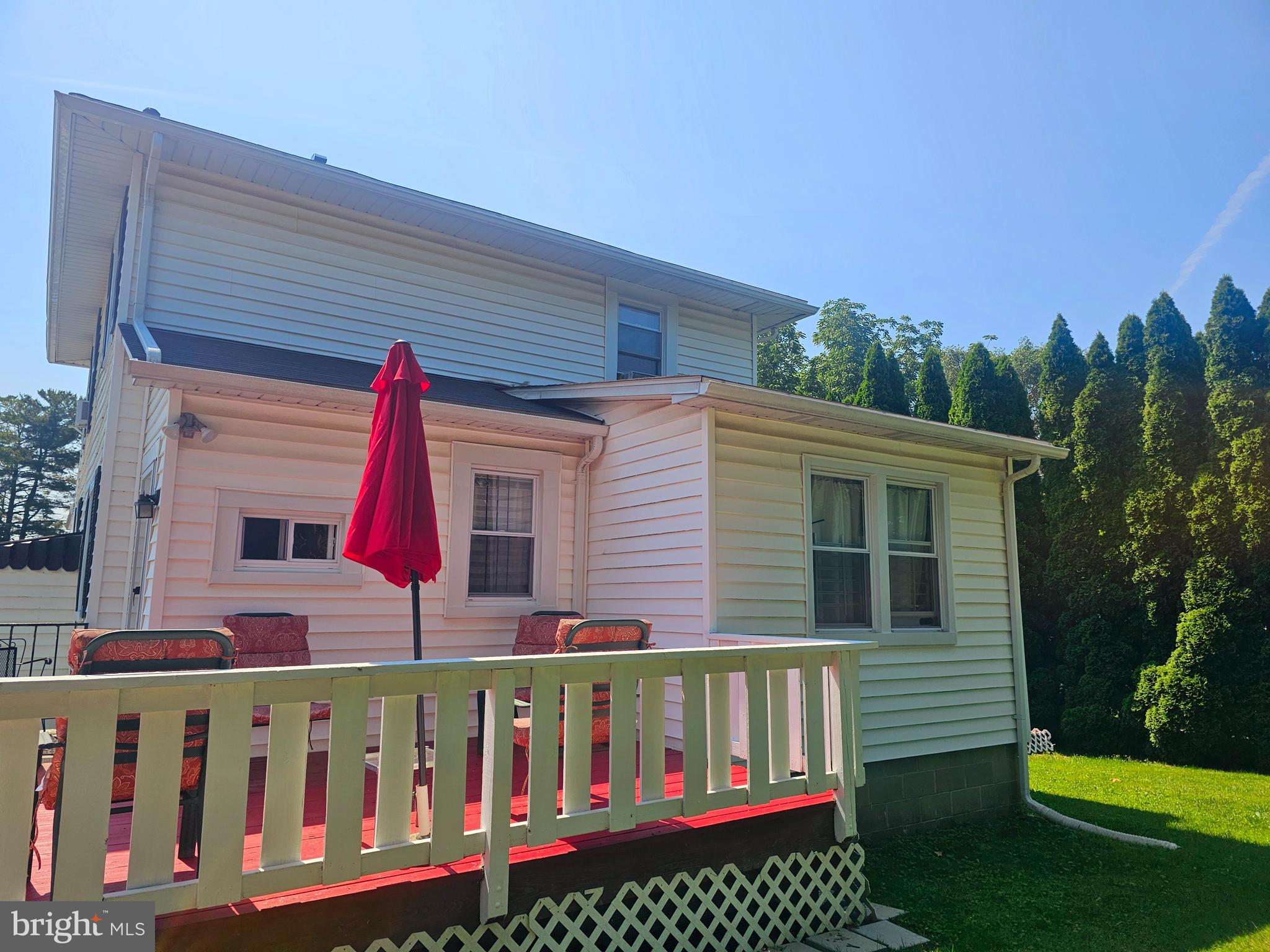 3506 Bayer Avenue Randallstown, MD 21133 - Photo 31 of 36 a front view of a house with yard