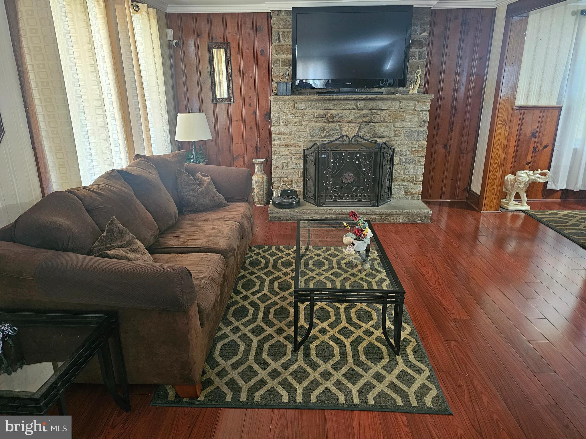 3506 Bayer Avenue Randallstown, MD 21133 - Photo 4 of 36 a living room with furniture and a flat screen tv