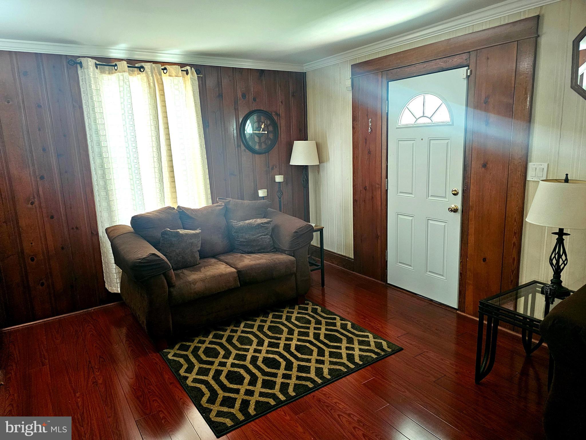 3506 Bayer Avenue Randallstown, MD 21133 - Photo 8 of 36 a living room with furniture and a window