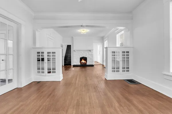 a view of a livingroom with wooden floor