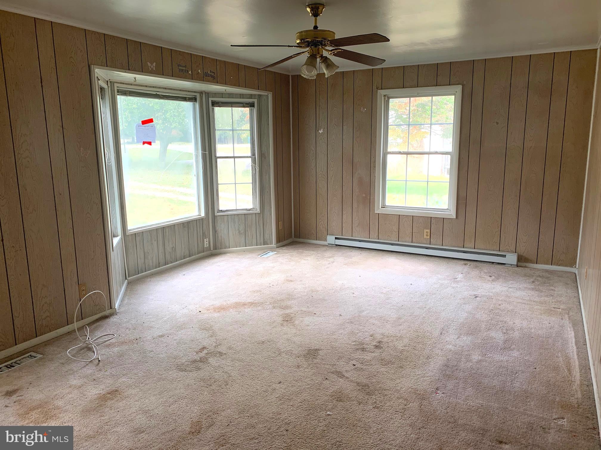 3104 Holland Cliffs Road Huntingtown, MD 20639 - Photo 5 of 12 living room with bay window