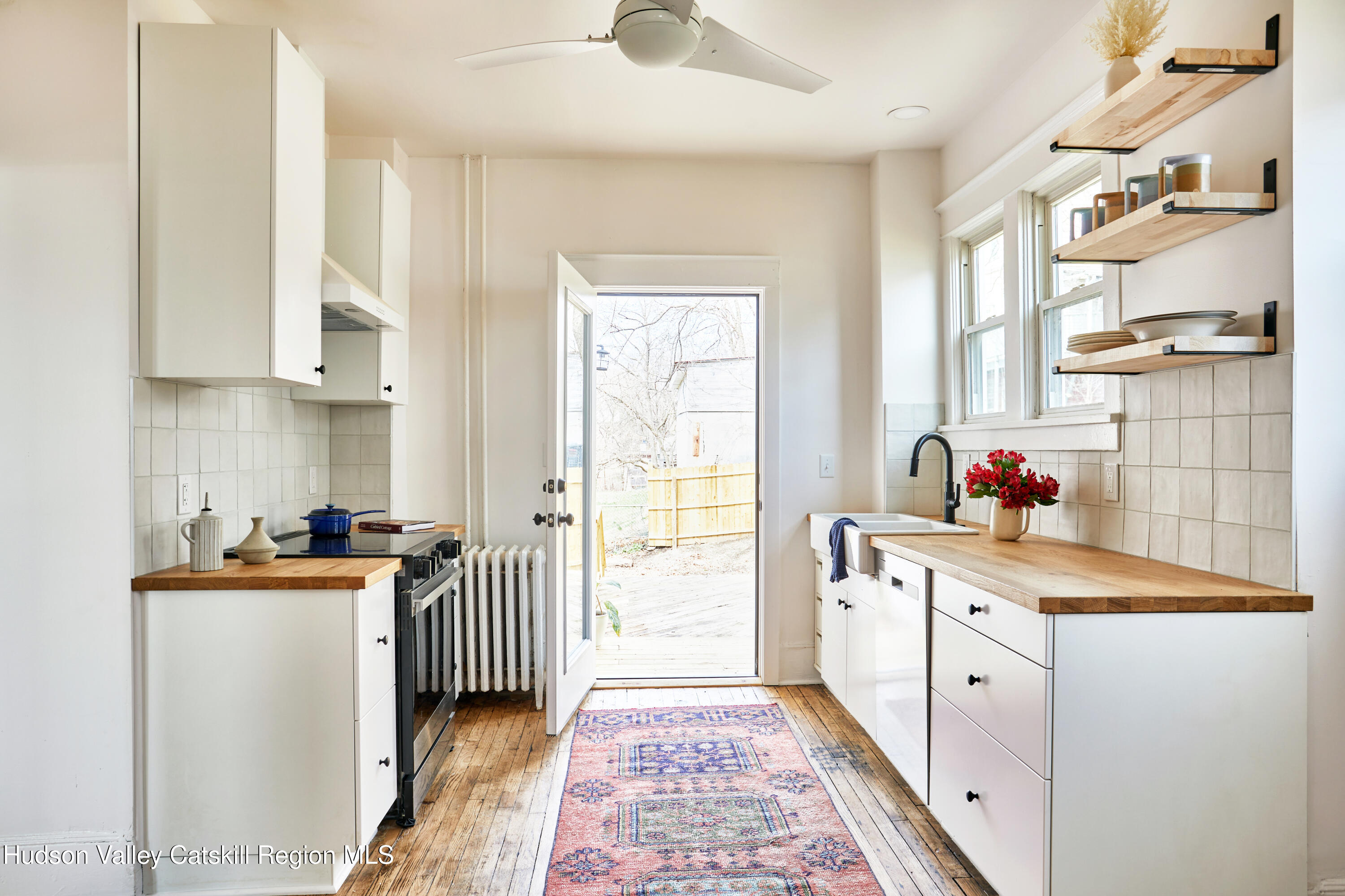 15 Summit Avenue Catskill, NY 12414 - Photo 11 of 28 a kitchen with stainless steel appliances a sink stove and cabinets