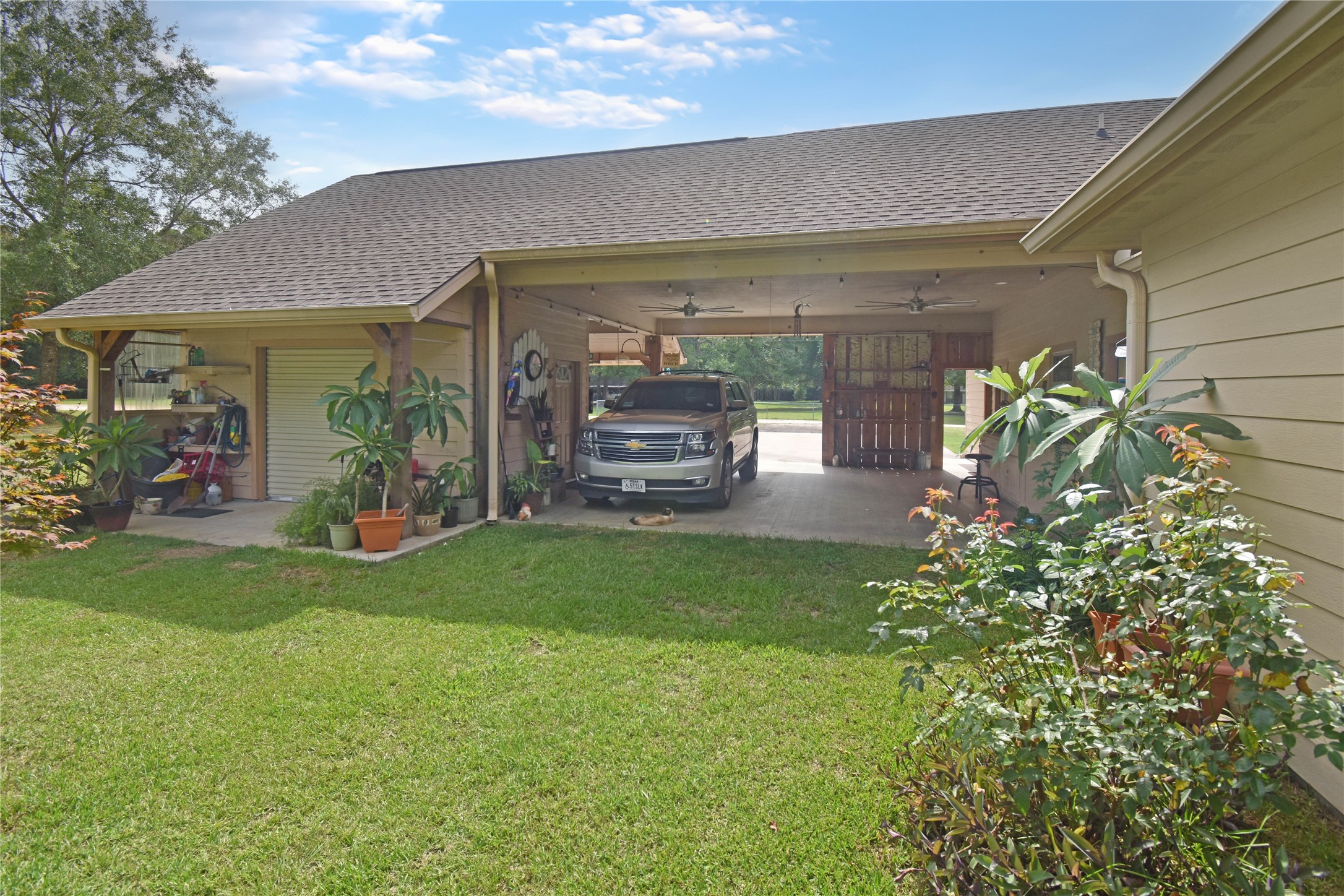115 Pr 5250 Warren, TX 77664 - Photo 13 of 21 a front view of a house with garden