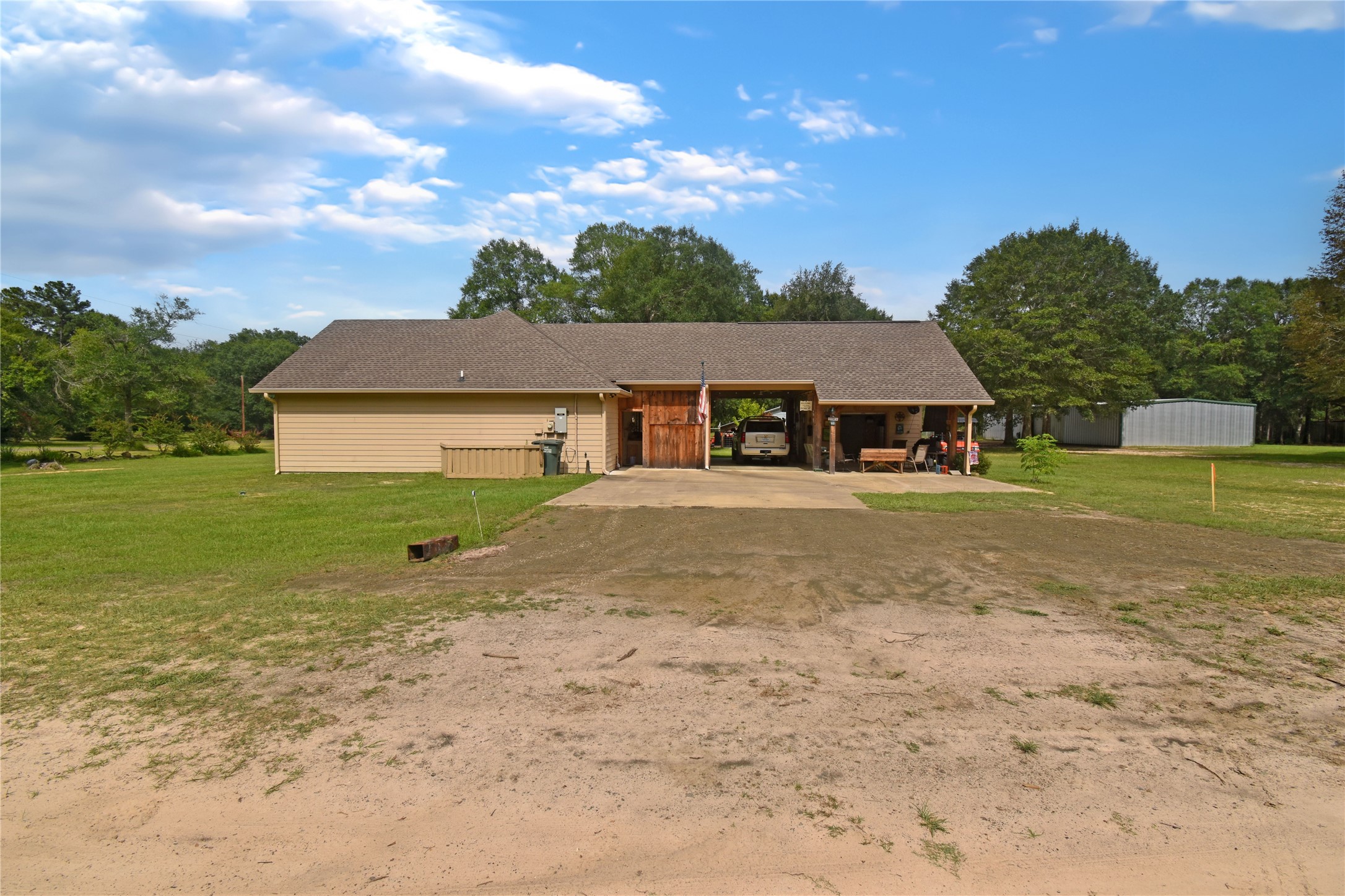 115 Pr 5250 Warren, TX 77664 - Photo 19 of 21 a front view of a house with garden