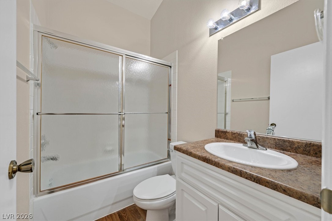 330 Warm Front Street Henderson, NV 89014 - Photo 12 of 25 This bright bathroom features a vanity with ample counter space and a clean shower tub.