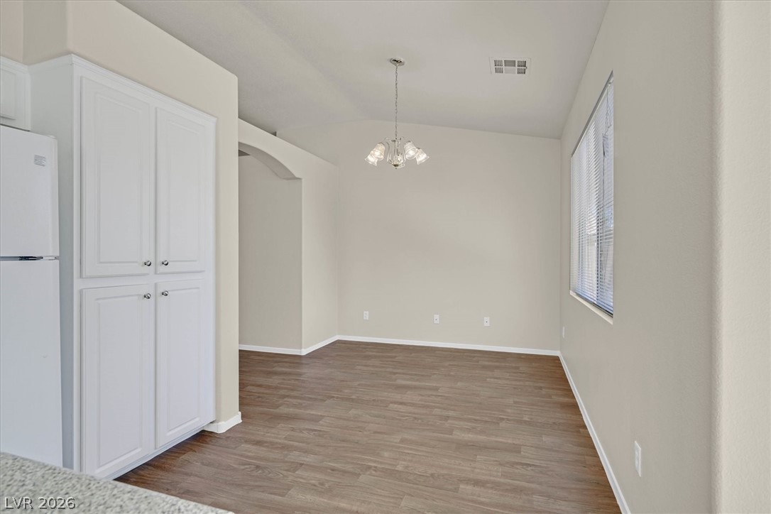 330 Warm Front Street Henderson, NV 89014 - Photo 17 of 25 This airy space features durable flooring, offering a blank canvas for personalized living.
