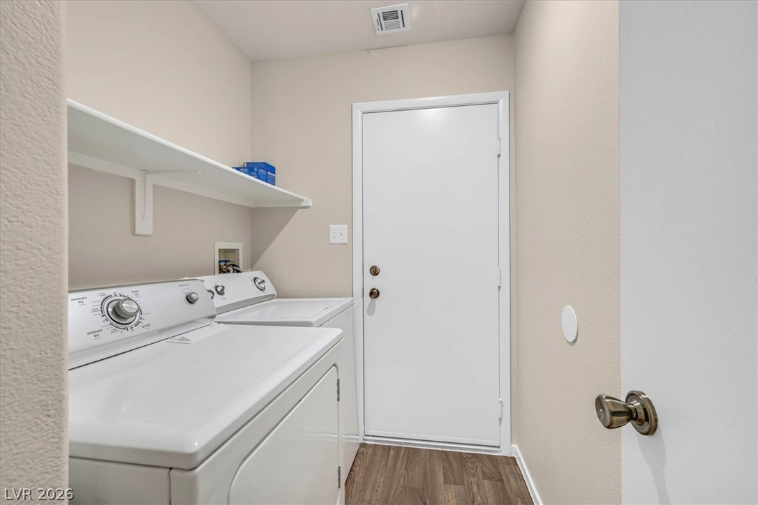 330 Warm Front Street Henderson, NV 89014 - Photo 20 of 25 This dedicated laundry space offers convenience and functional design for everyday living.