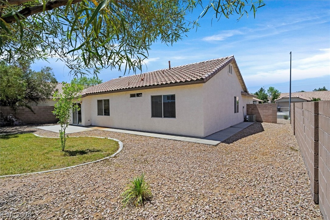 330 Warm Front Street Henderson, NV 89014 - Photo 24 of 25 This residence features a well-maintained exterior and a private yard, perfect for outdoor enjoyment.