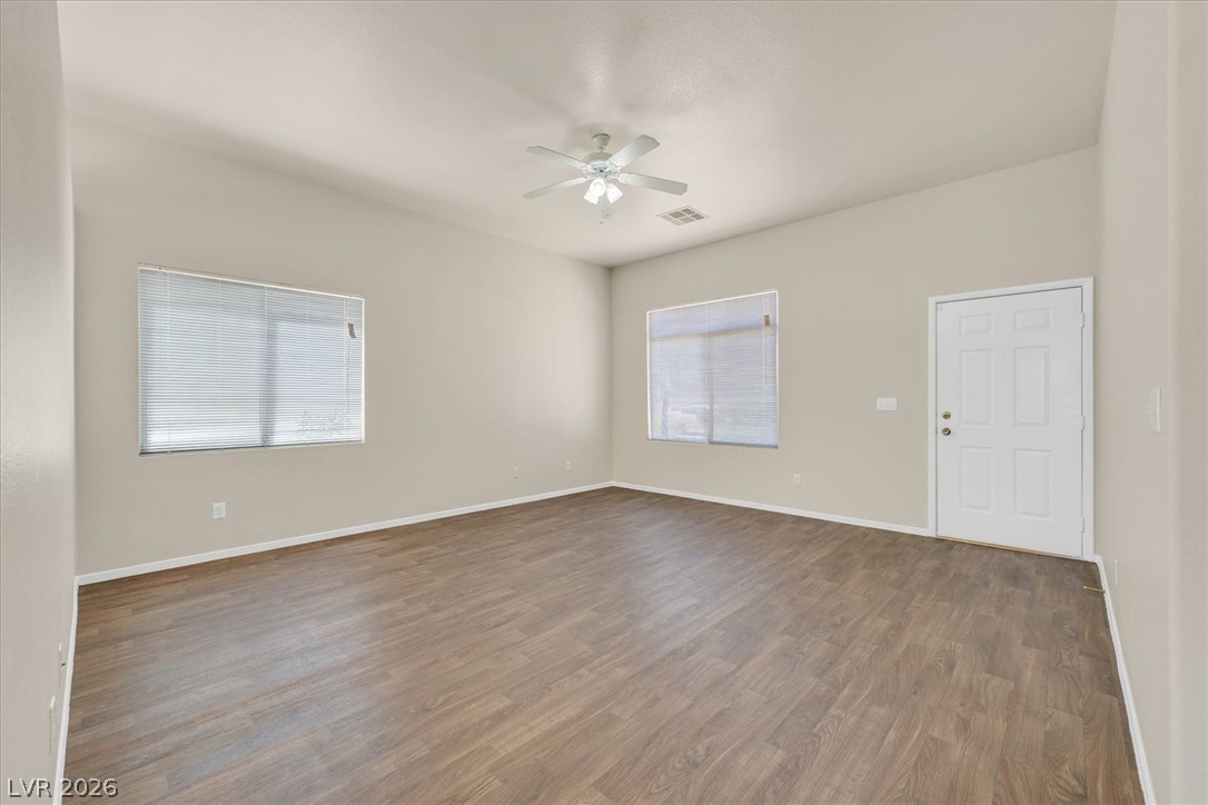 330 Warm Front Street Henderson, NV 89014 - Photo 3 of 25 This airy space features durable flooring and ample natural light, ideal for comfortable living.