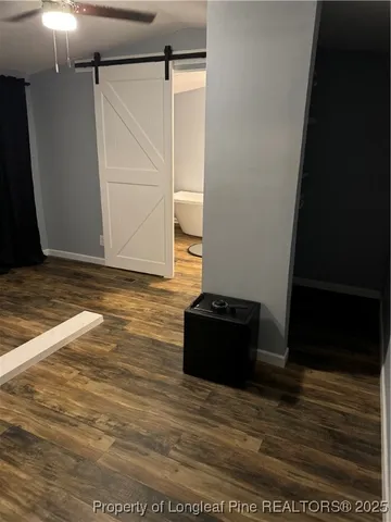 a view of a living room and kitchen