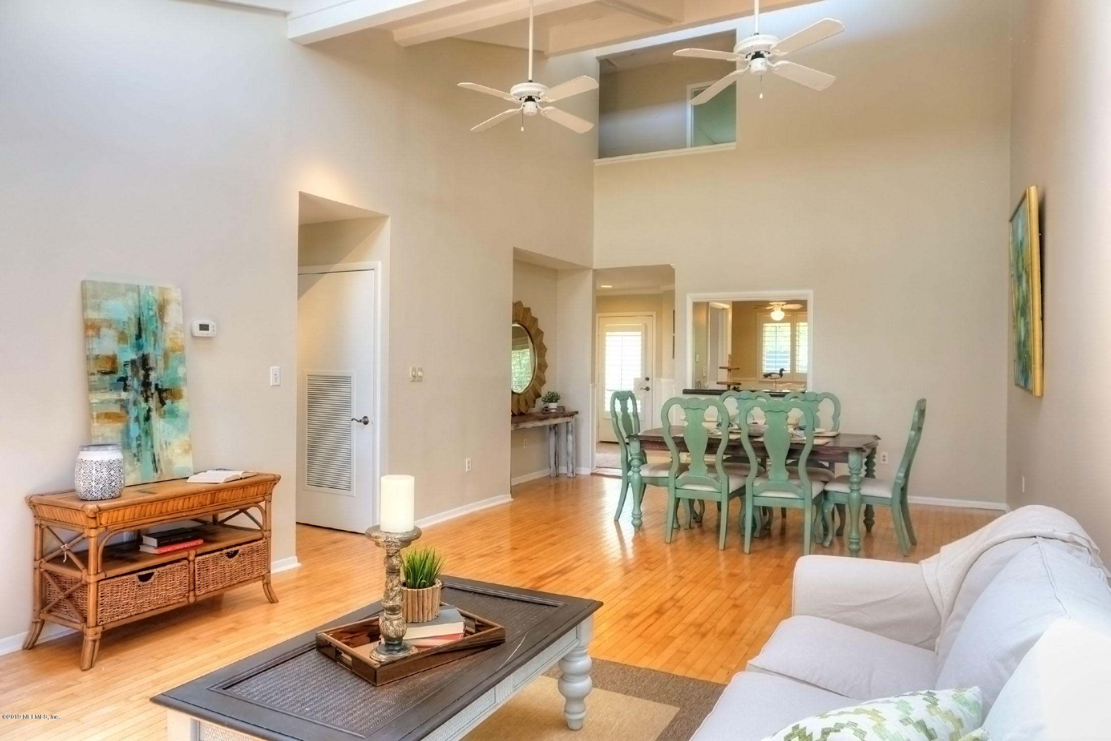 3404 Sea Marsh Road Fernandina Beach, FL 32034 - Photo 5 of 32 a living room with furniture and wooden floor