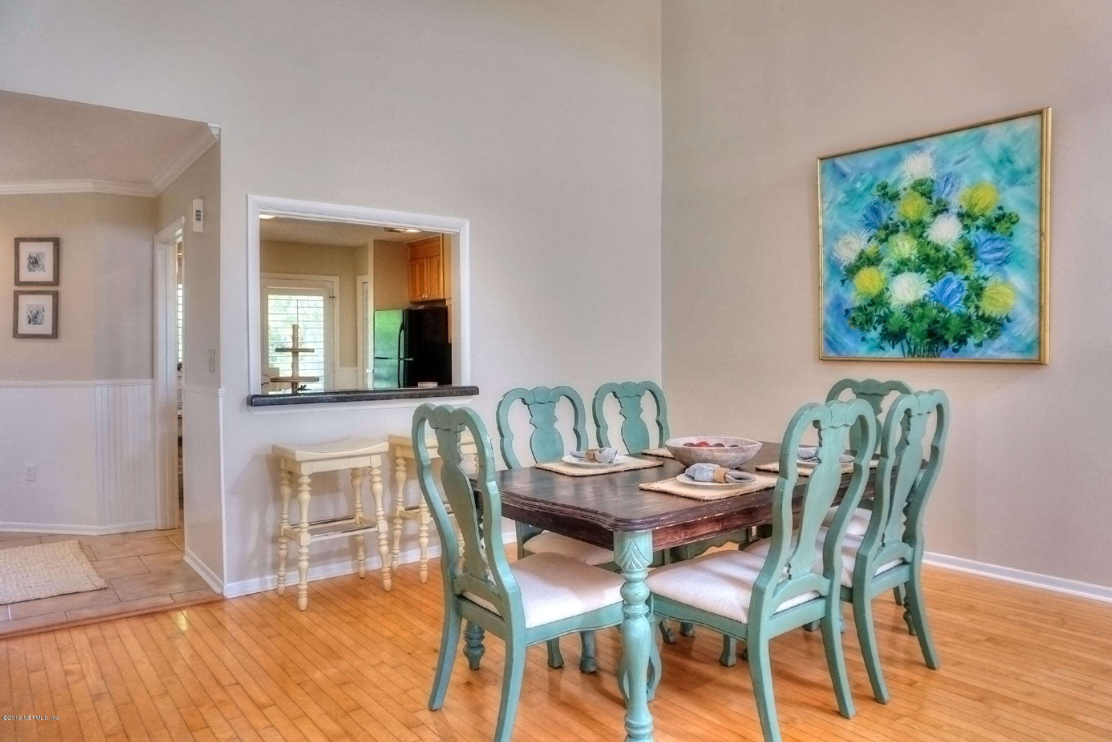 3404 Sea Marsh Road Fernandina Beach, FL 32034 - Photo 7 of 32 a dining room with furniture and wooden floor