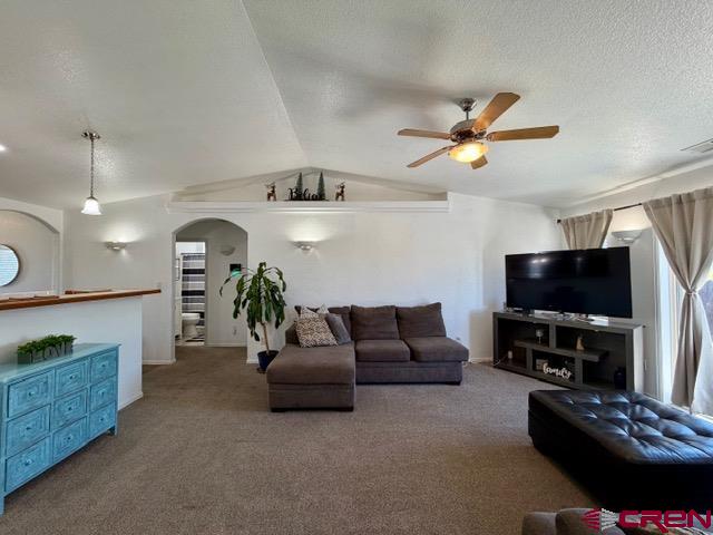 544 20th Street Delta, CO 81416 - Photo 17 of 44 a living room with furniture and a flat screen tv