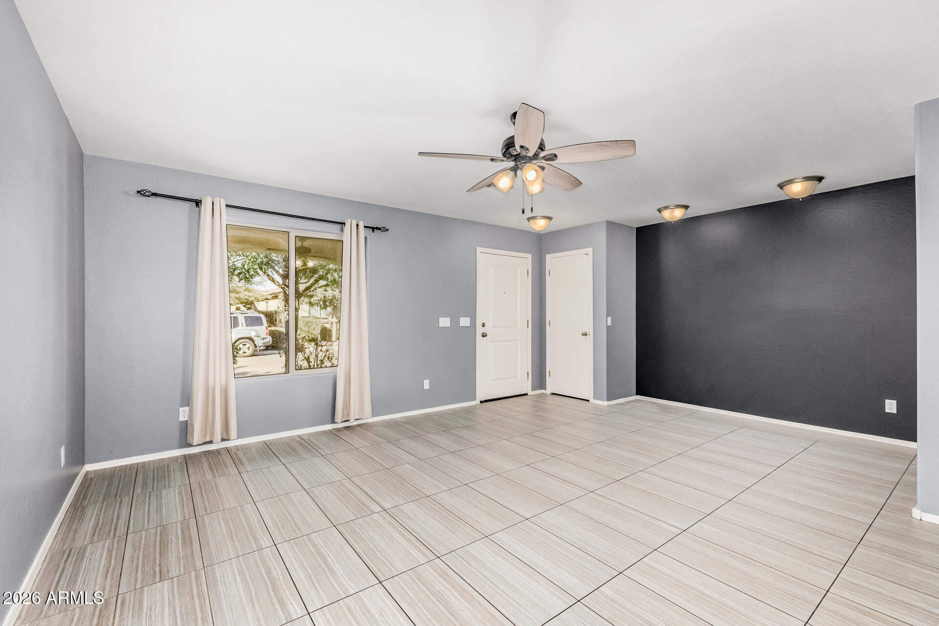 1877 West Rd Agent Street Apache Junction, AZ 85120 - Photo 5 of 24 a view of an empty room with a window