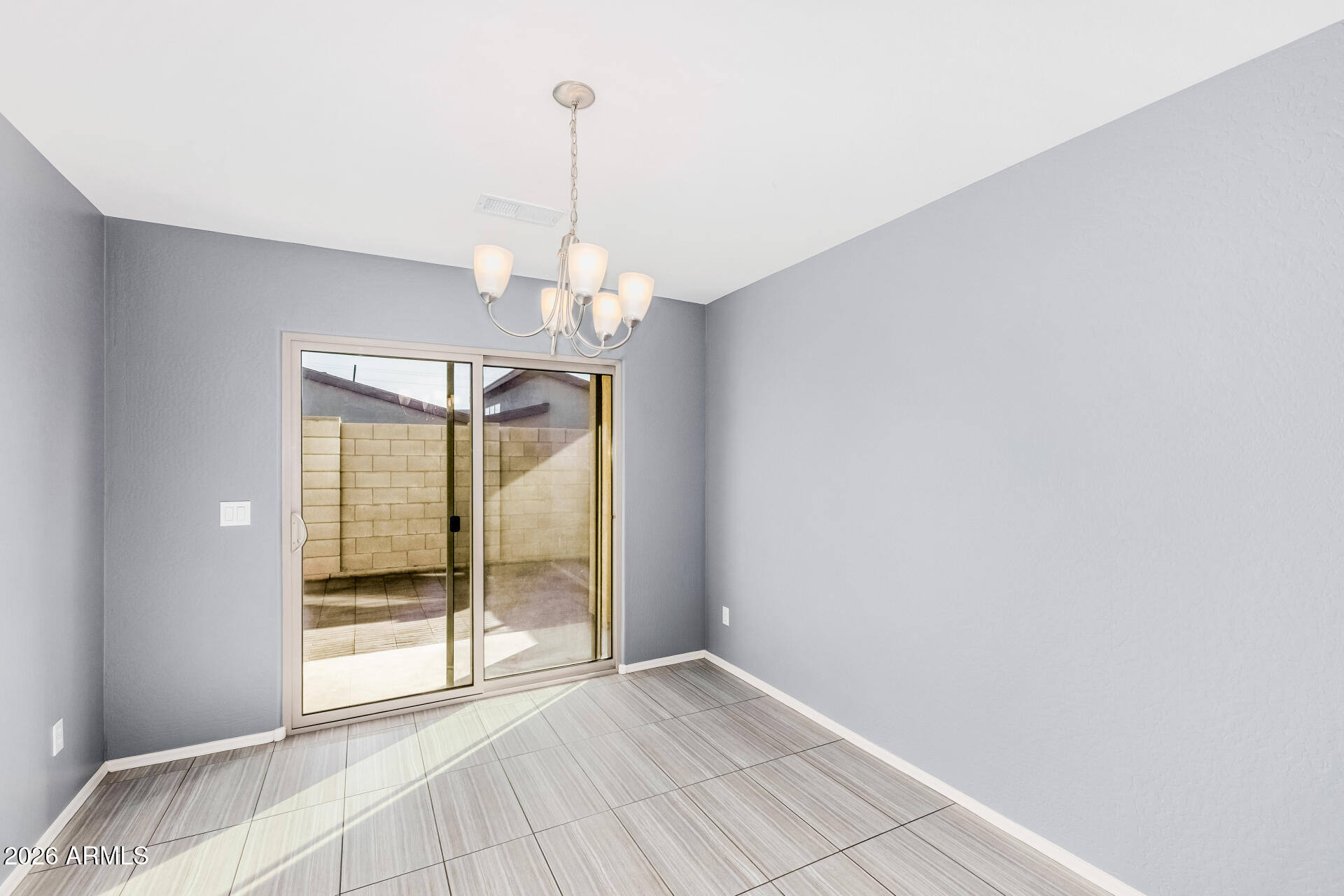 1877 West Rd Agent Street Apache Junction, AZ 85120 - Photo 7 of 24 a view of an empty room with glass door