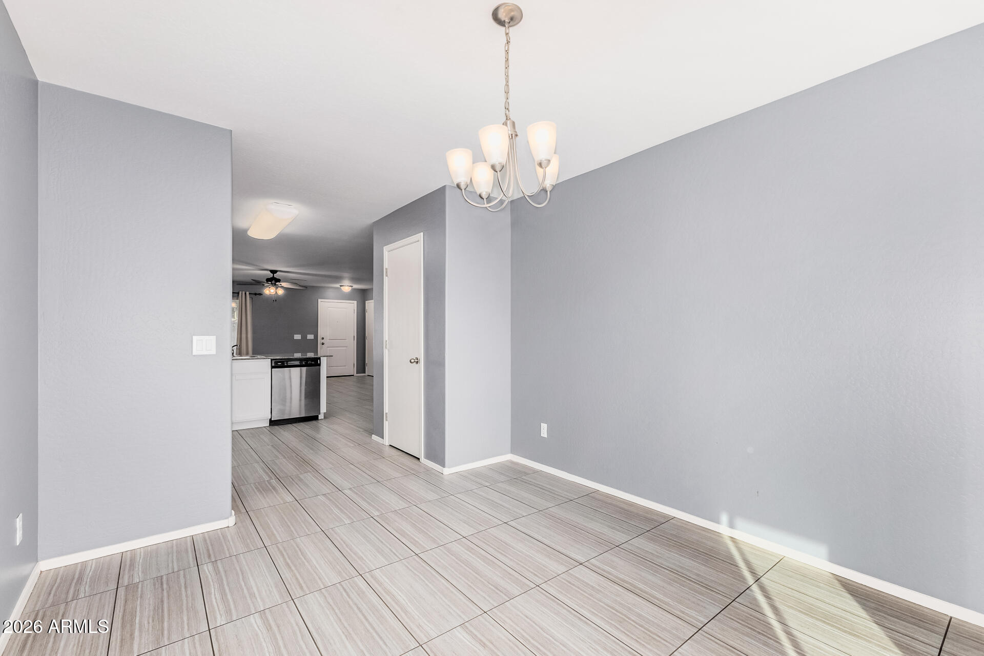 1877 West Rd Agent Street Apache Junction, AZ 85120 - Photo 8 of 24 a view of a kitchen with a sink and a chandelier